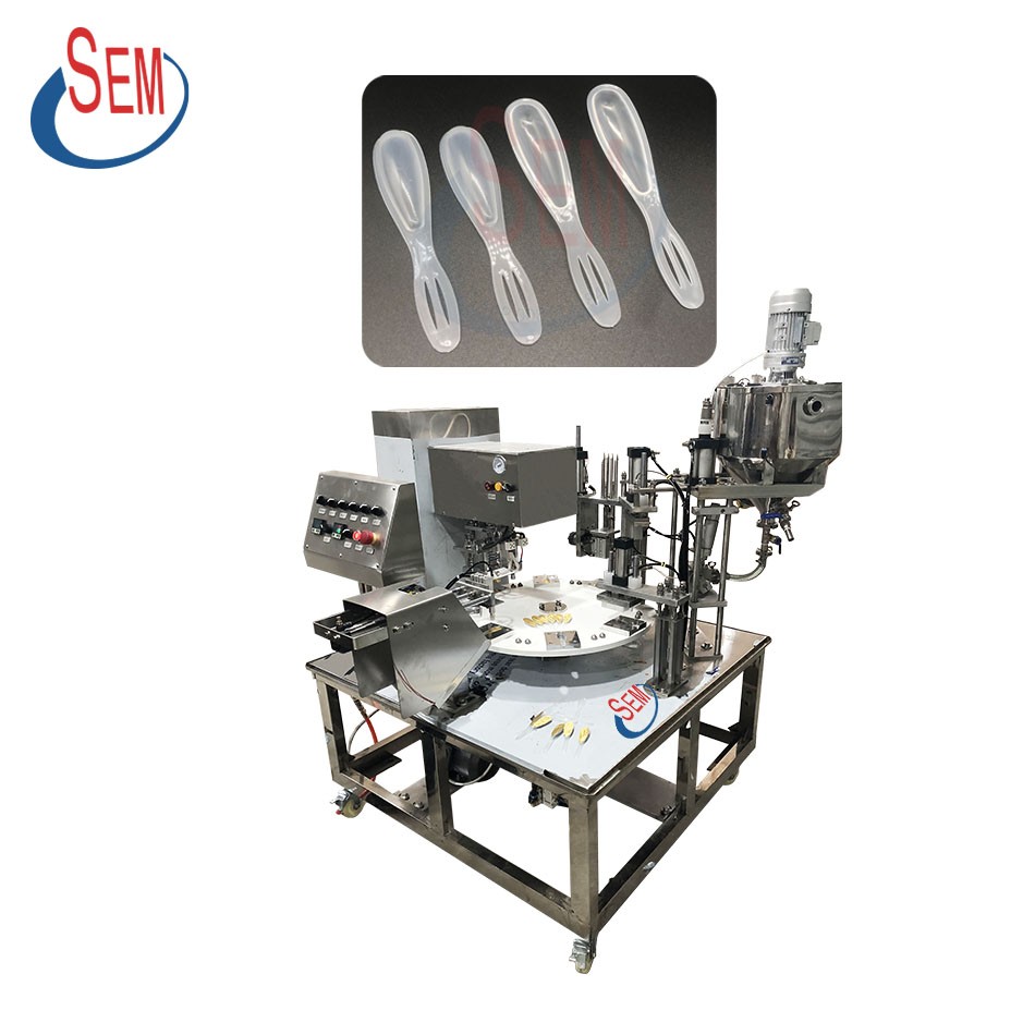 The equipment is a honey spoon filling machine