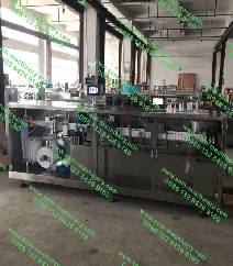 Automatic olive oil, sauce packing machine. automatic forming, filling, sealing, cutting. 