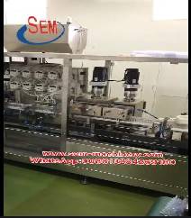 ​Automatic plastic ampoule liquid packing machine with a labeling machine.