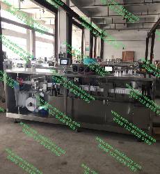 Automatic liquid packing machine for plastic ampoule packing.